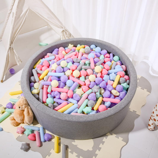 Close-up of STARBOLO Macaron balls showing thick, durable plastic for long play