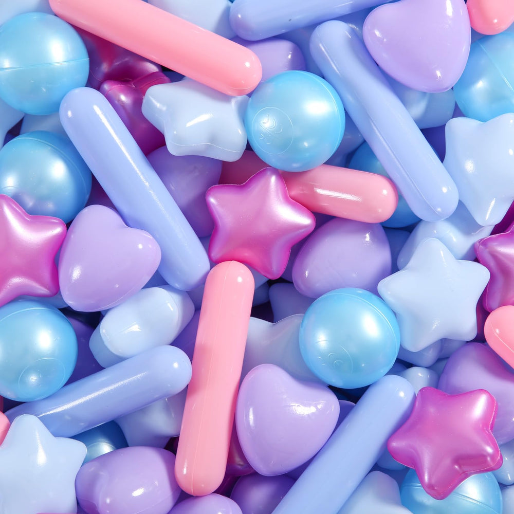 STARBOLO Mermaid Colors ball pit balls for immersive sensory play in a backyard or playroom.