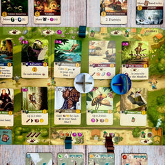 Sun and moon tokens from Everdell Duo adding dynamic timing to play