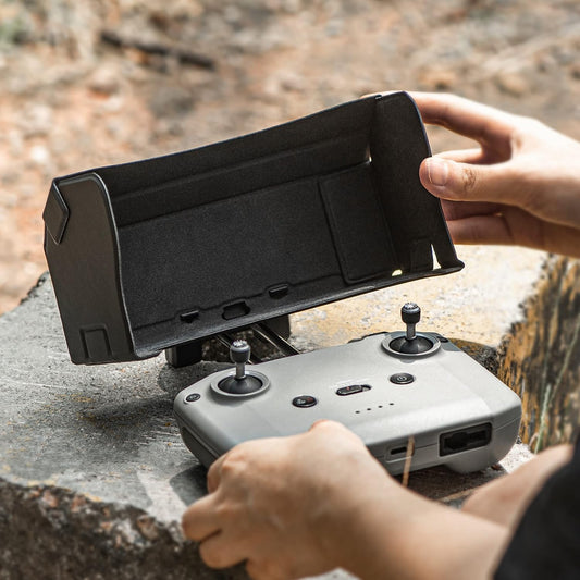 STARTRC Sun Hood on Mini 4K controller protects screen and enhances outdoor visibility.