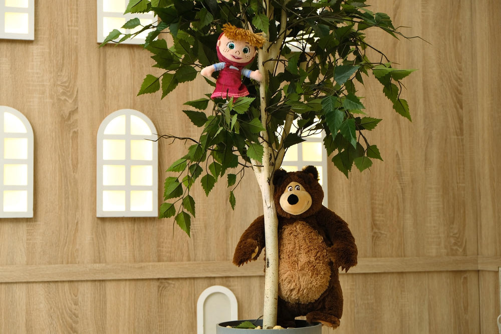 Stitched-details on Masha plush, expressive features for imaginative play.