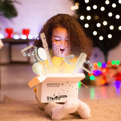 Stoie's chime bar with stick creates clear tones for melodic exploration.