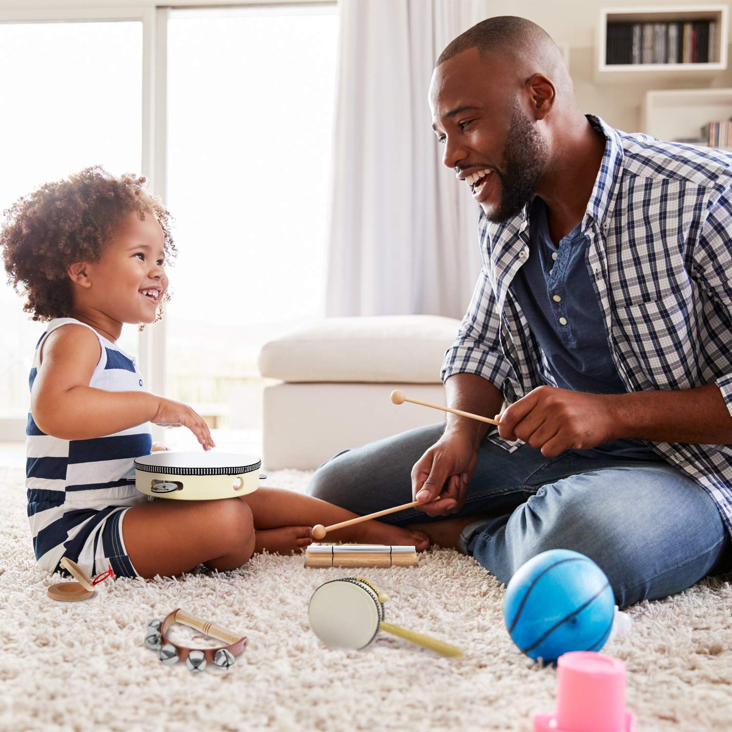 Stoie's hand bells brighten playtime, encouraging sensory discovery and coordination.