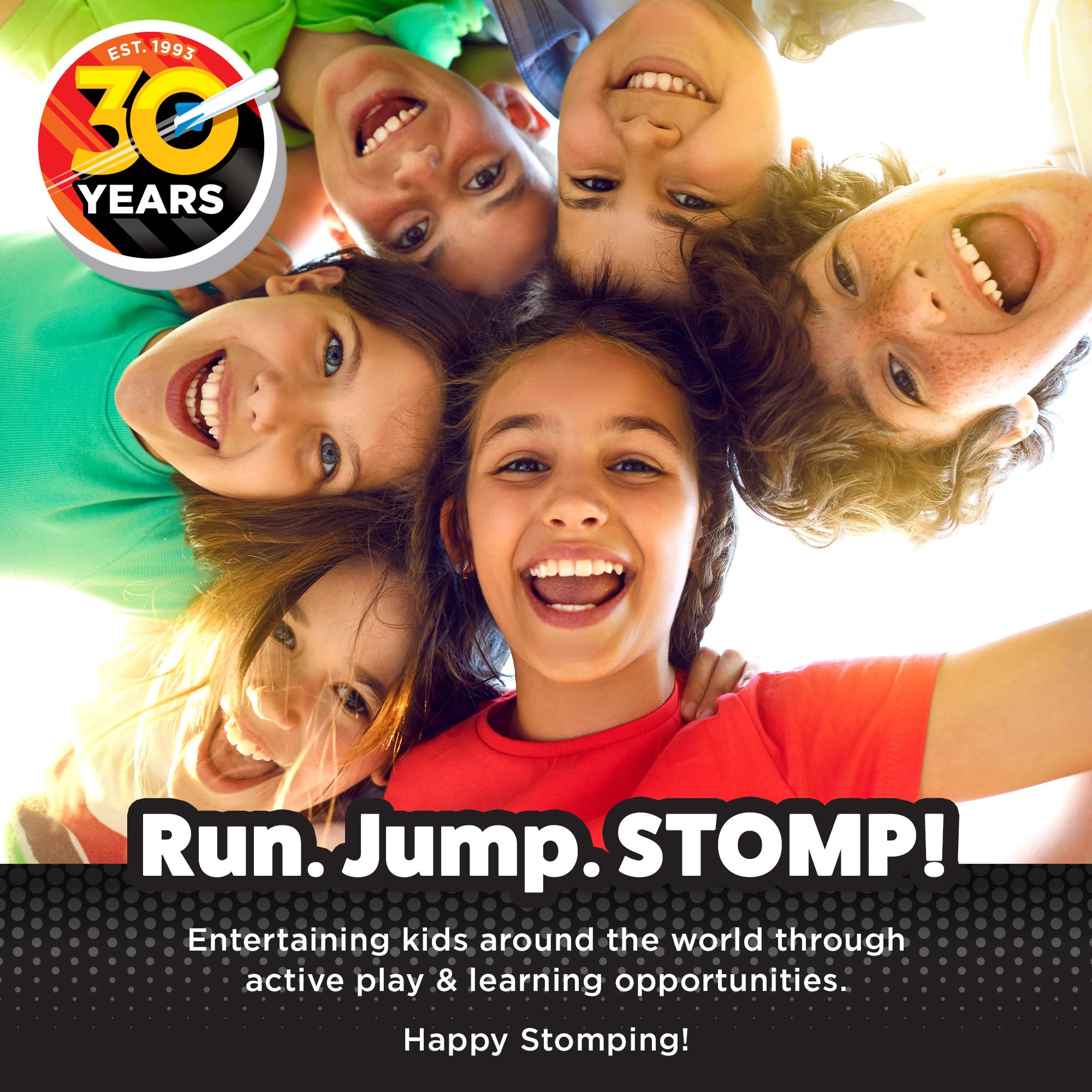 Outdoor family scene featuring Stomp Rocket Dino-Soar in action