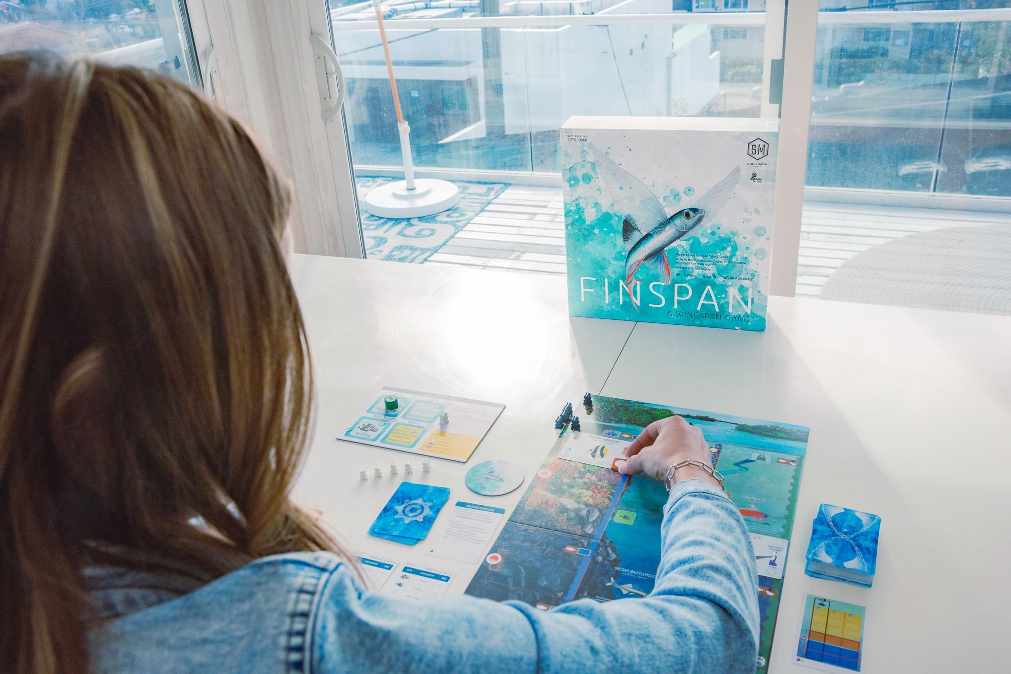 Stonemaier Finspan family-friendly gameplay shown for groups and couples