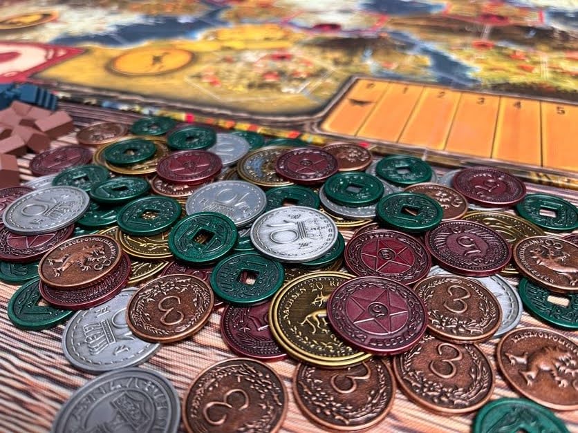 Stonemaier metal coins make cosplay authentic and jingle in a pouch.