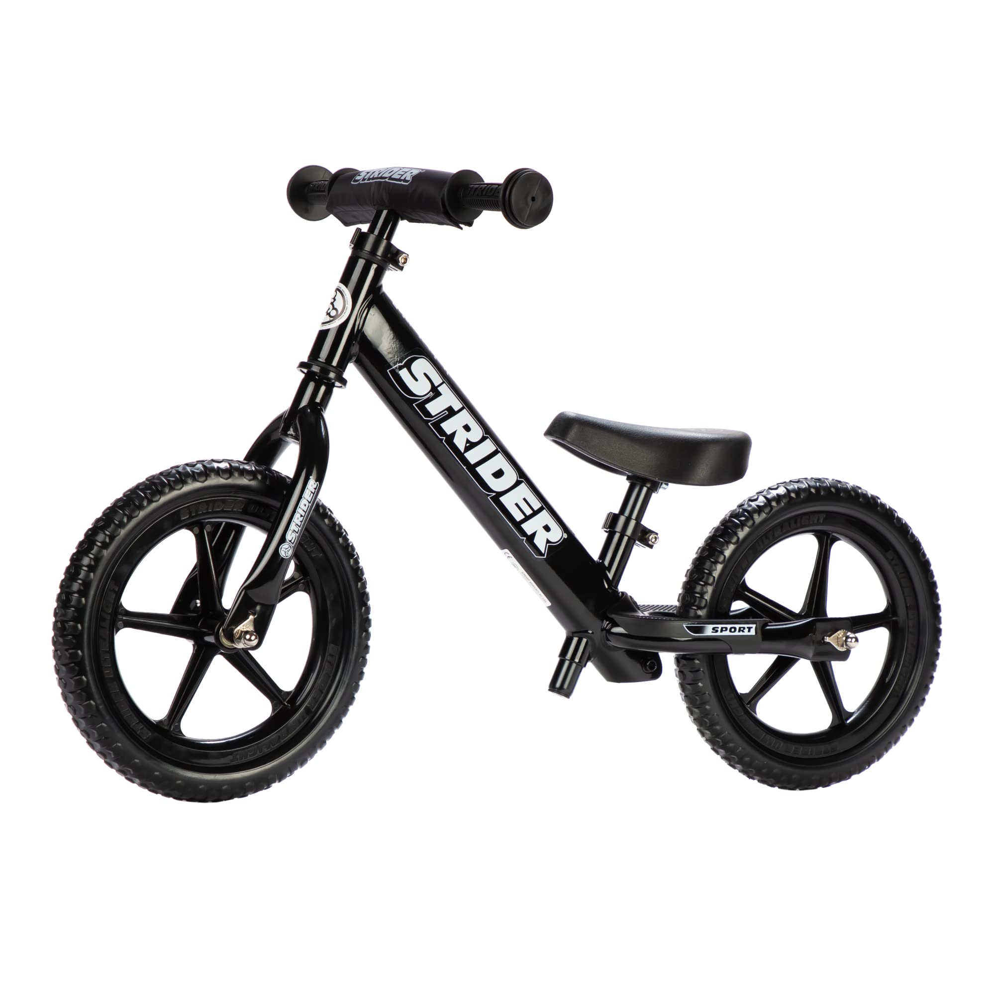 Strider 12-inch balance bike side view shows easy maneuverability for beginners.