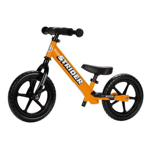 Strider 12-inch Sport Bike orange frame ready for balance practice