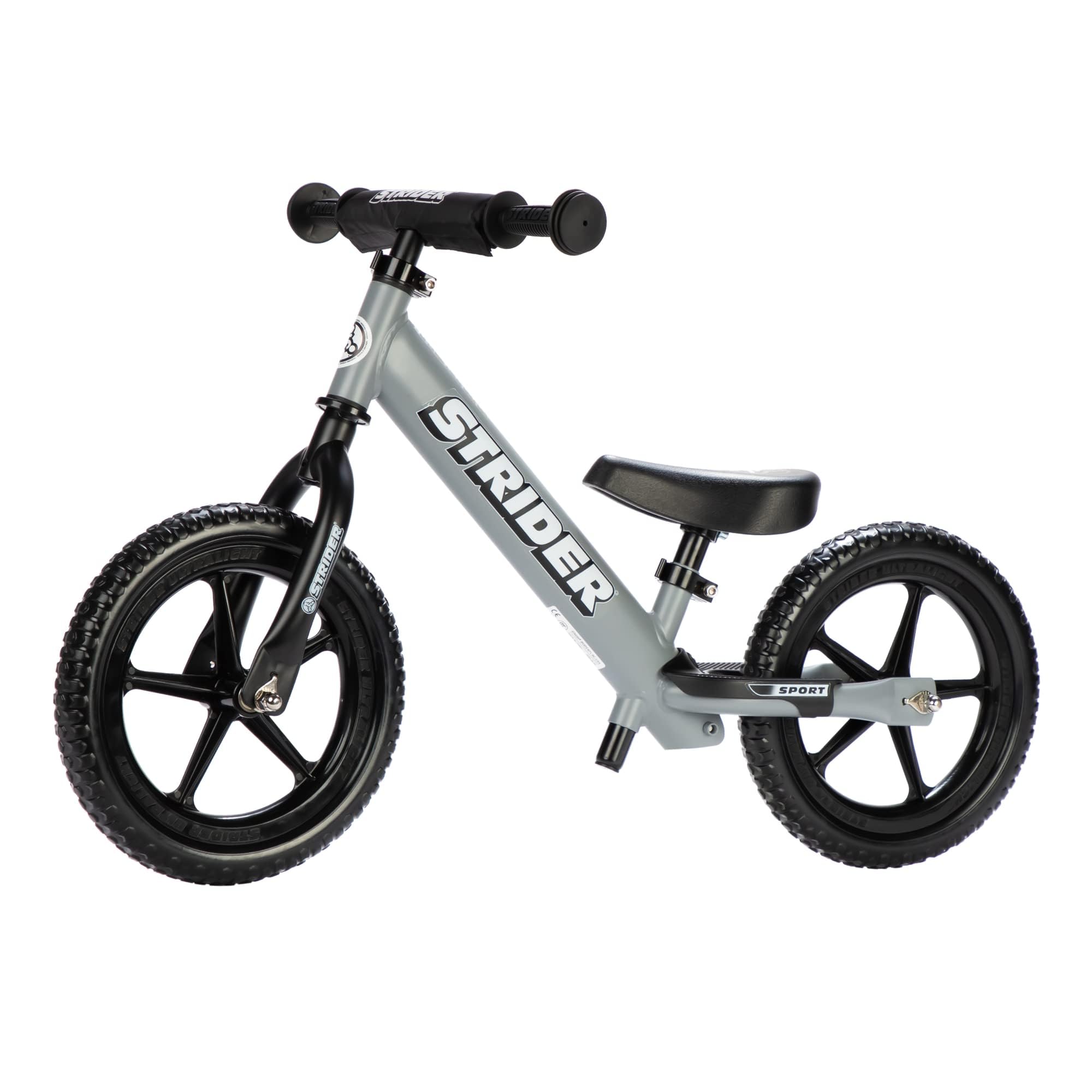Strider 12” Sport Bike matte gray front view showing balance-friendly design