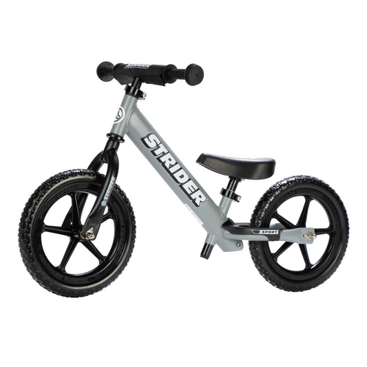 Strider 12” Sport Bike matte gray front view showing balance-friendly design