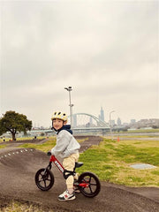 Strider red foam tires that never go flat for worry-free practice.
