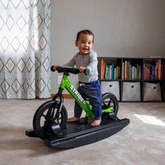 Strider rocking base supports riders up to 40 pounds for growing children.