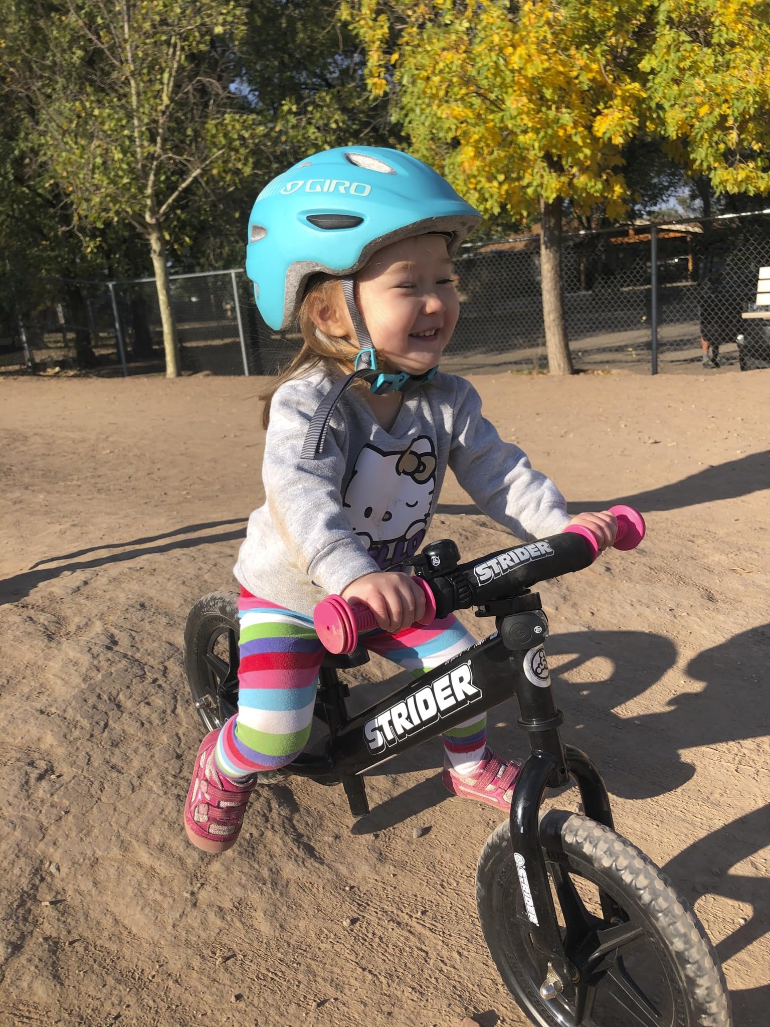 Strider safety pad and padded seat protect young riders on first rides.