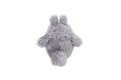 Studio Ghibli Totoro plush resting on a display shelf.