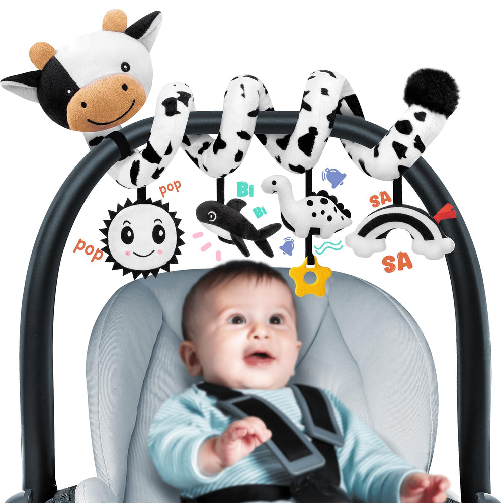 Stuffed Spiral Cow Toy hanging enhances newborn visual tracking and exploration.
