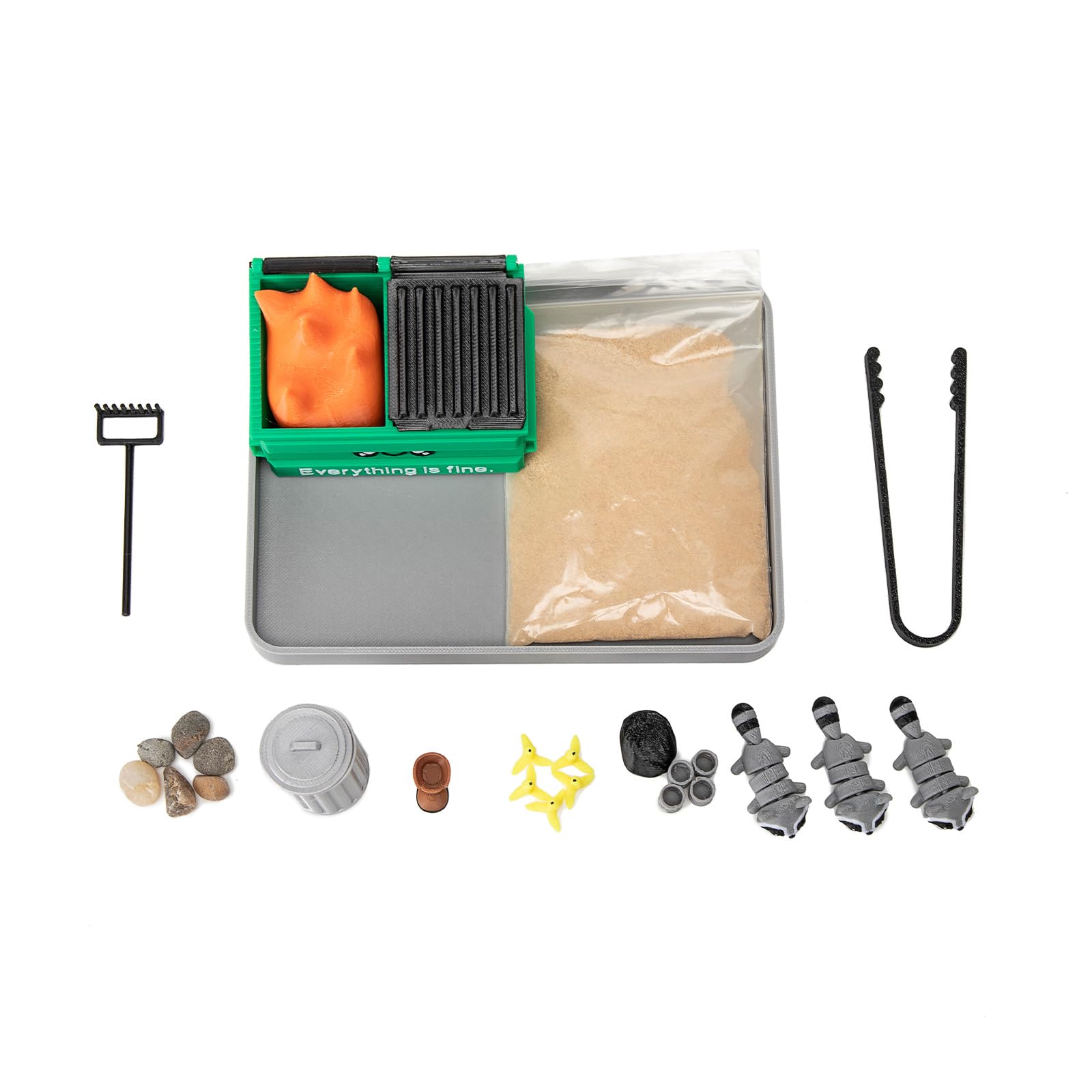 Stylor zen garden stones and accessories arranged for tactile play.