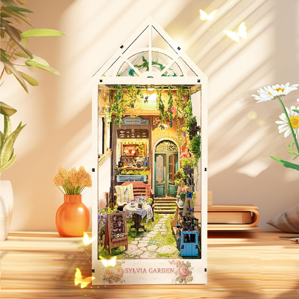 SUDOPOR Sylvia Garden miniature tea courtyard inside a green garden setting