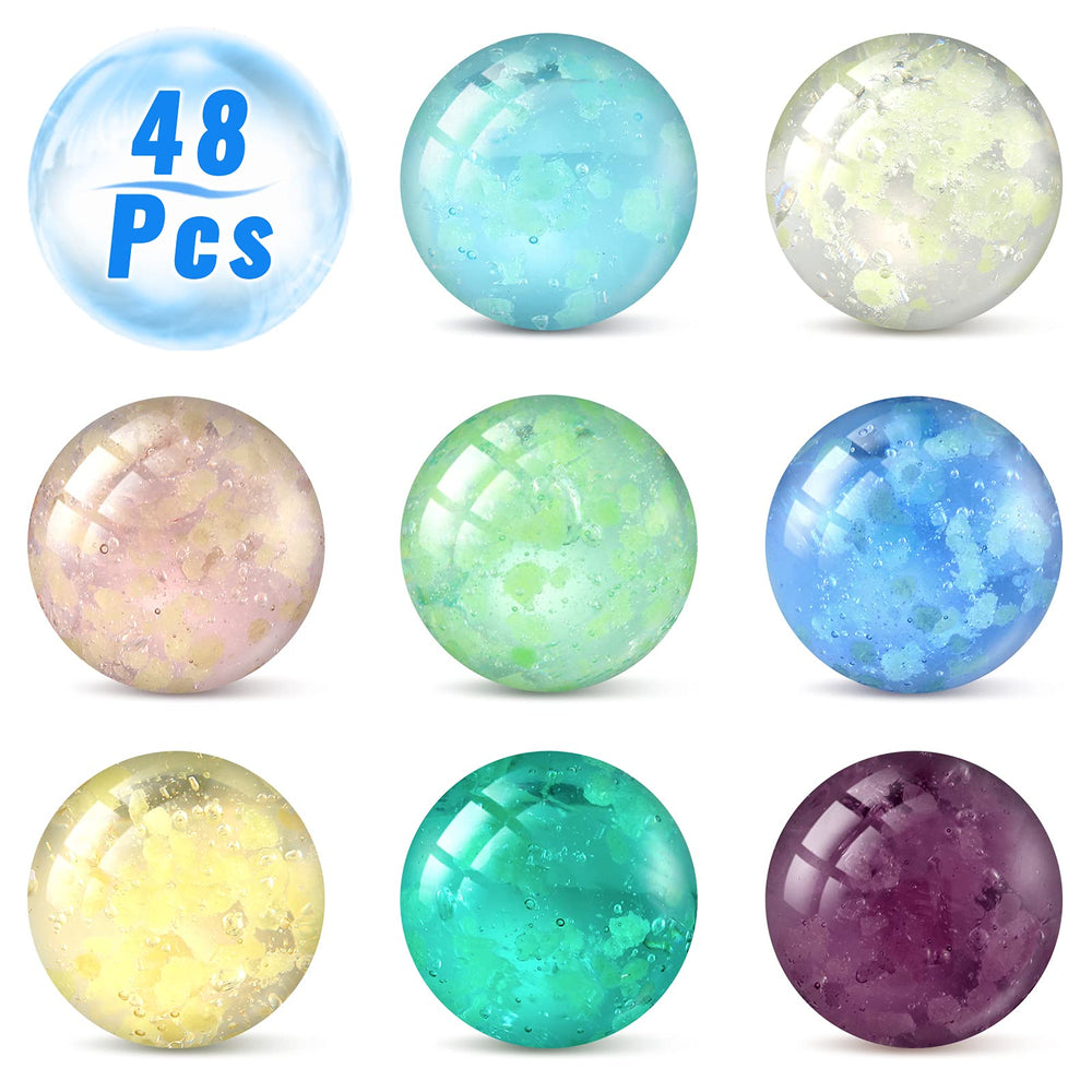 Sumind glow marbles glow in green hues from different light angles for ambience.