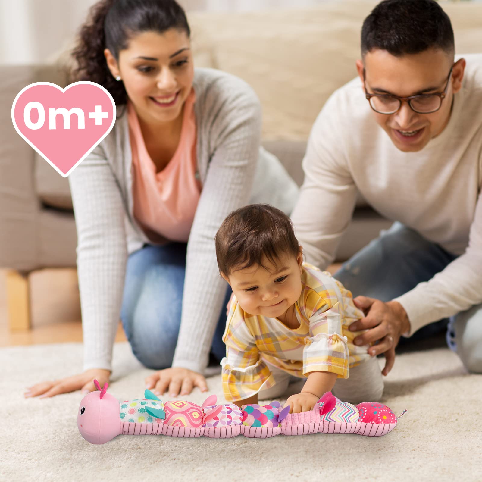 Sumobaby pink caterpillar plush softly supports sensory play and discovery.