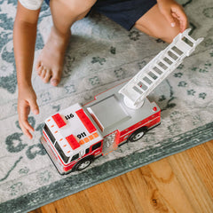 Motorized drive on Sunny Days Maxx Action firetruck powers fast pretend missions.