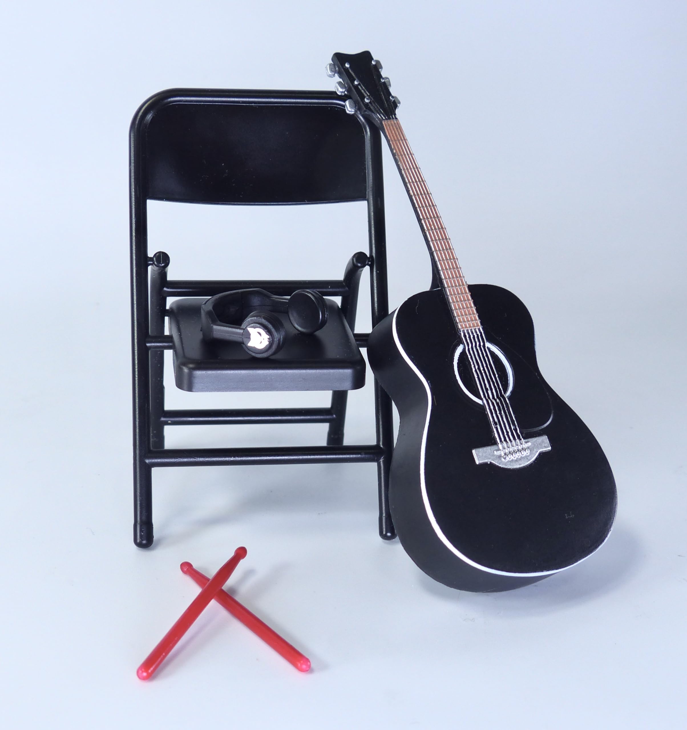 Super Action Stuff guitar adds authentic music accessory vibes to scenes
