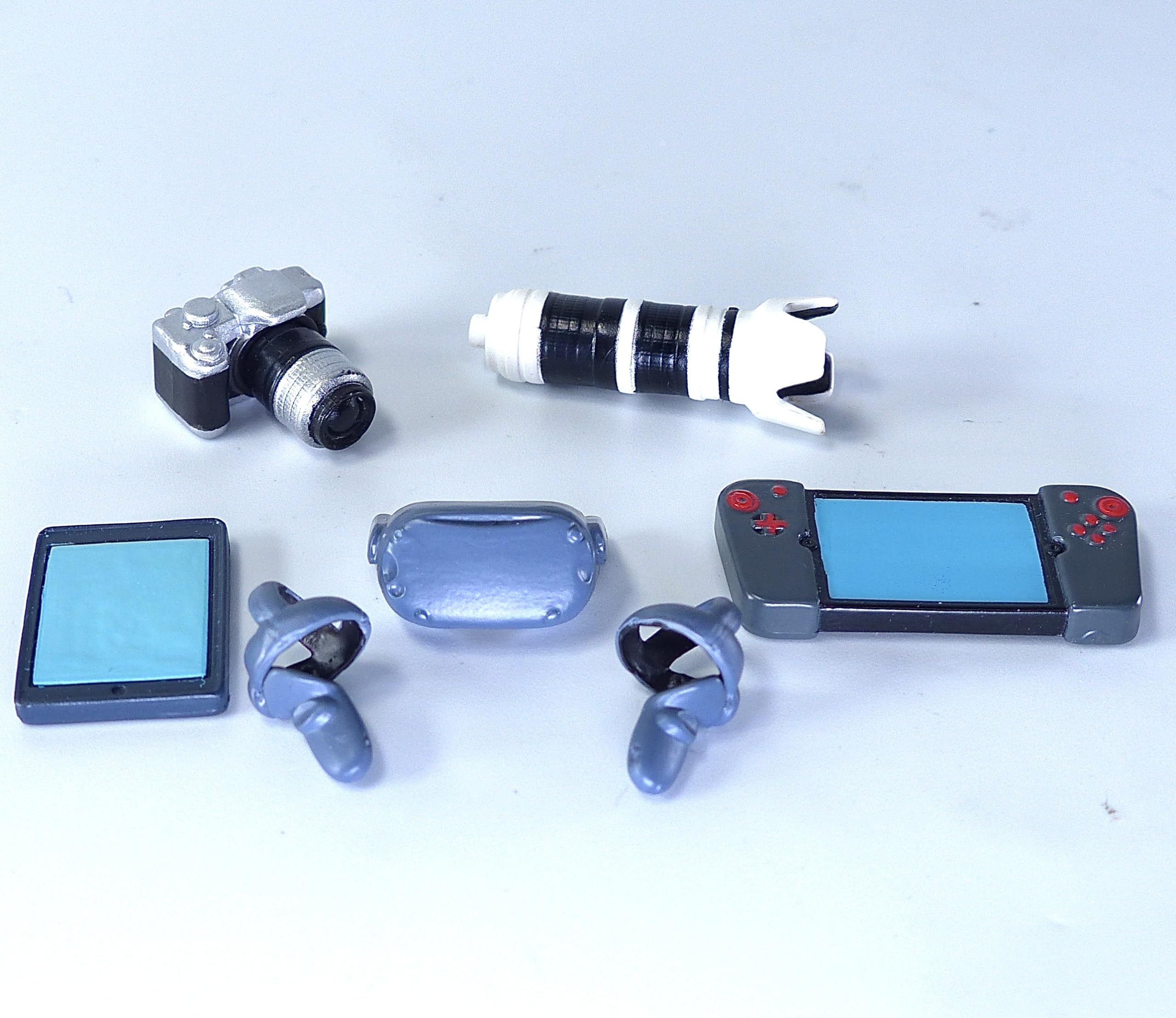 Super Action Stuff tablet computer pairs with figures for storytelling scenes