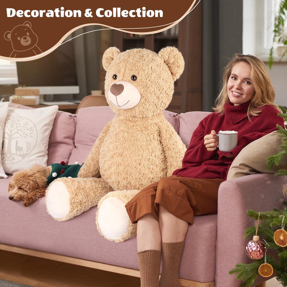 SuzziPals living room setup with a warm giant teddy bear