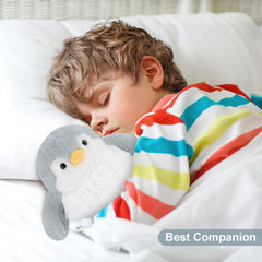 SuzziPals Penguin Plush hugging child for comforting companionship.