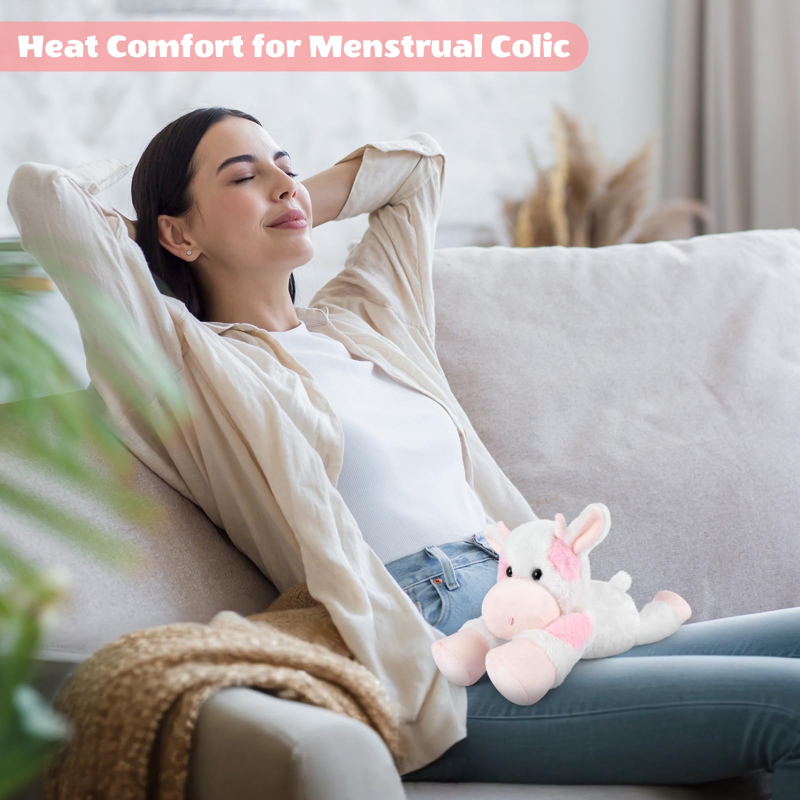 SuzziPals cow plush cuddling scene provides comforting snuggle.