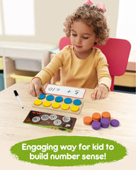 Six dice to introduce variability in number games