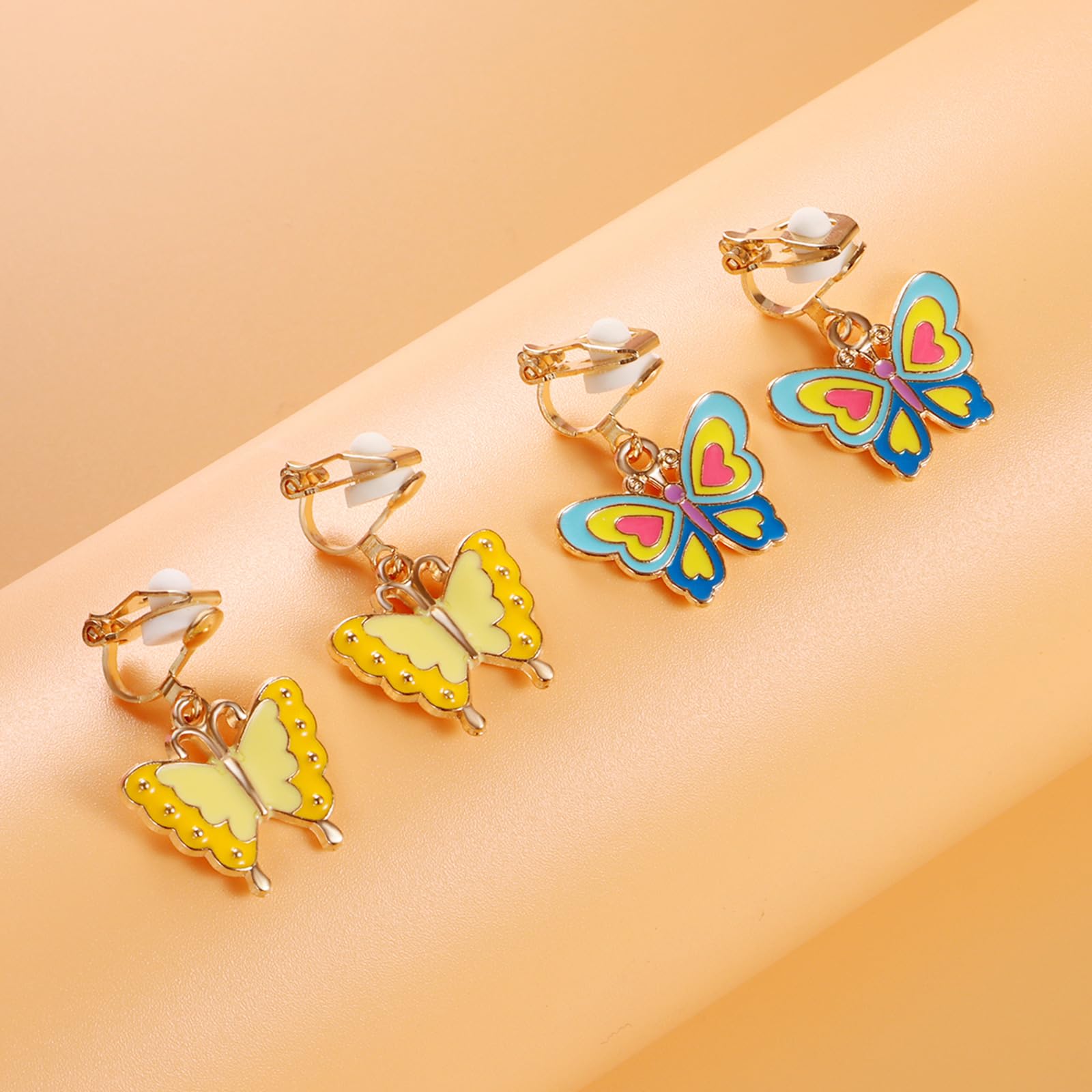 SYNLIN clip-on earrings with butterfly theme brighten outfits for versatile kids wear.
