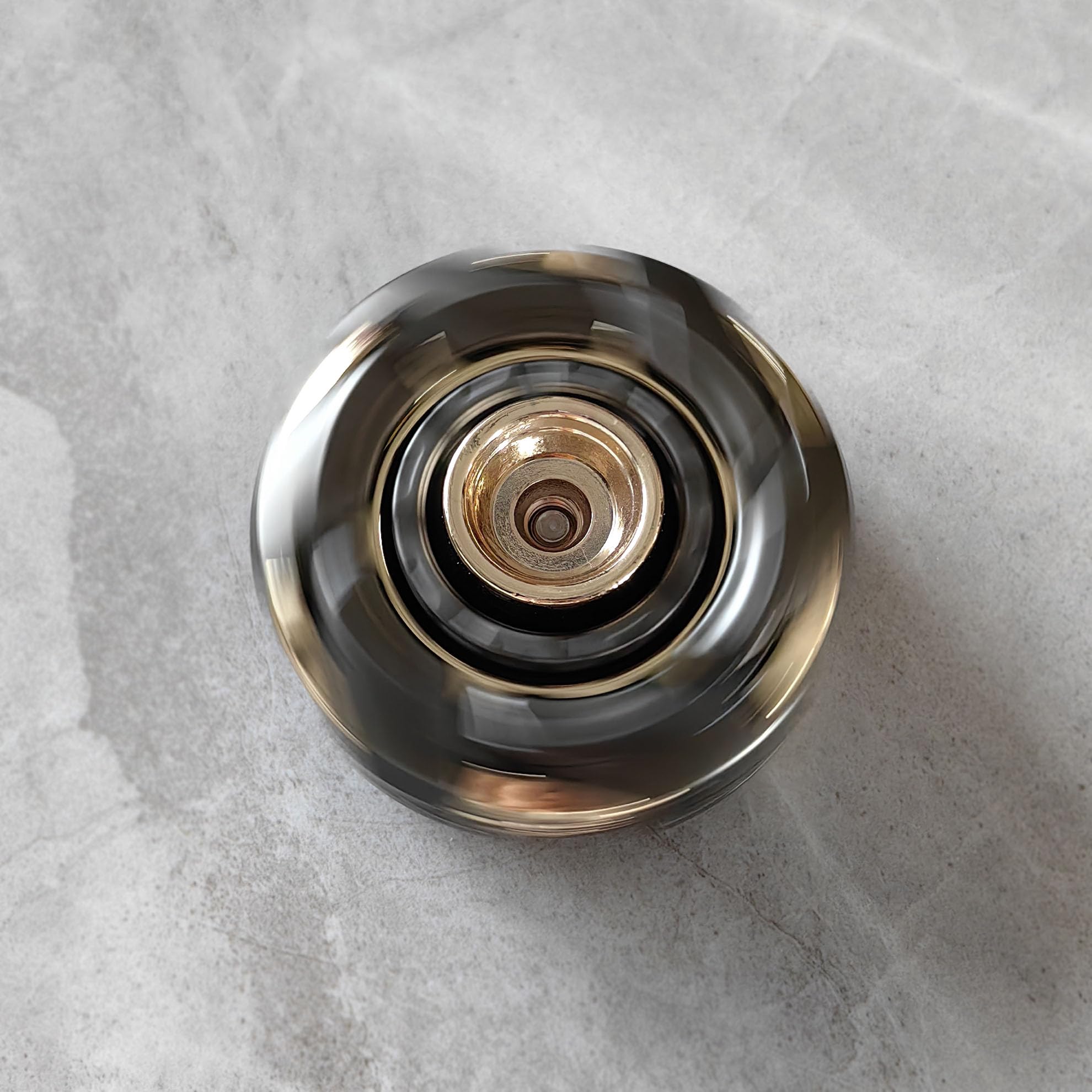 T-Conceal spinning top in knight gray for compact daily carry.
