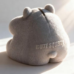 Taba squishy hamster toy in use for stress-relief fidgeting