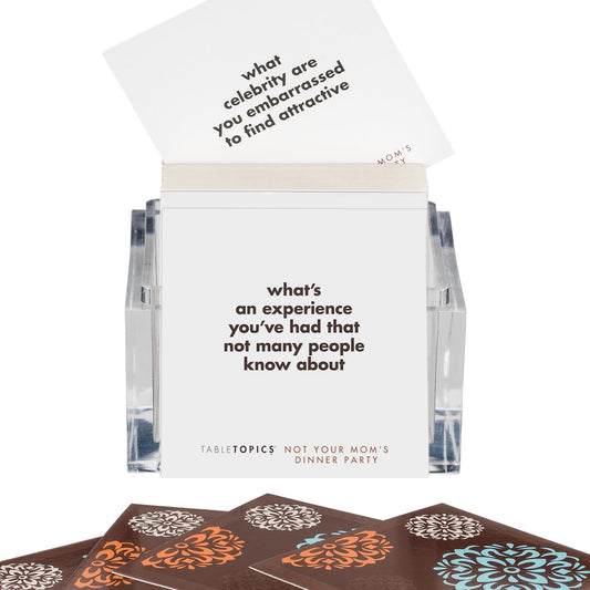 TableTopics 135-question cards close-up fueling lively talks.