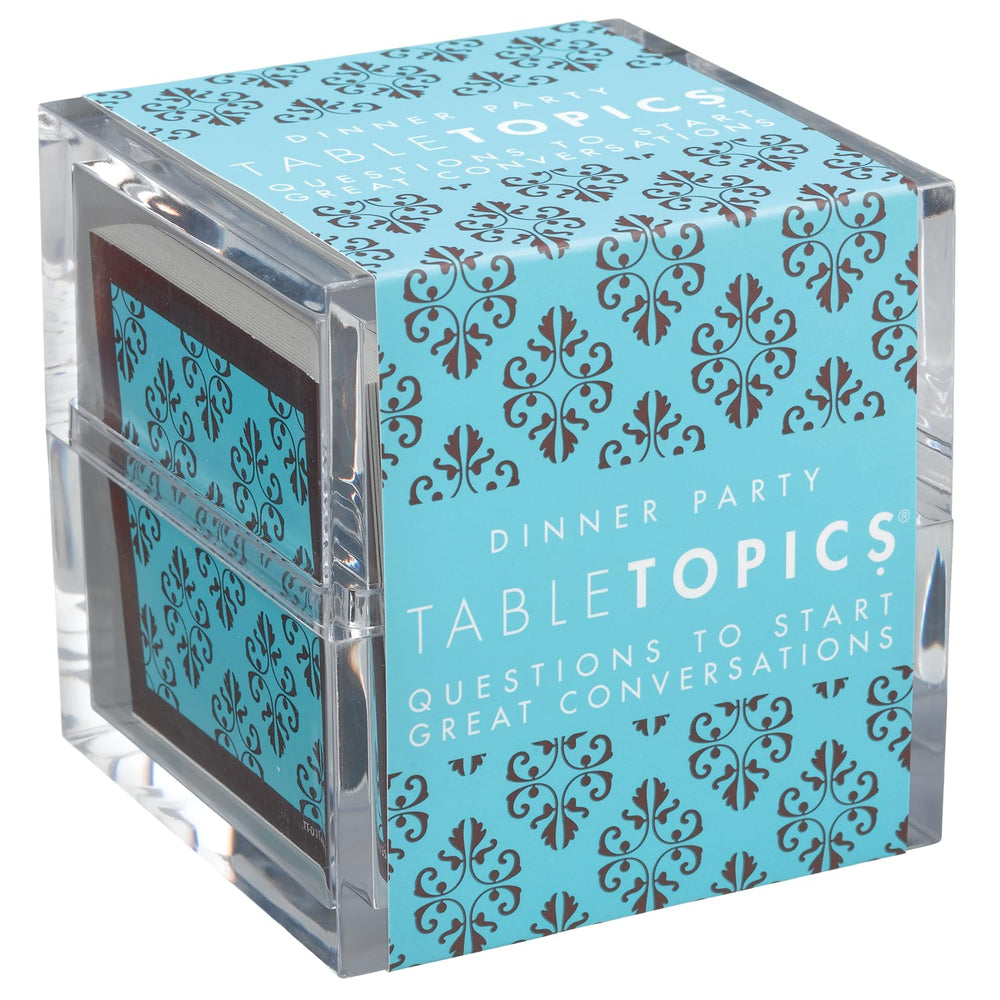 TableTopics dinner party cards in a clear cube, ideal for easy hosting and conversation.