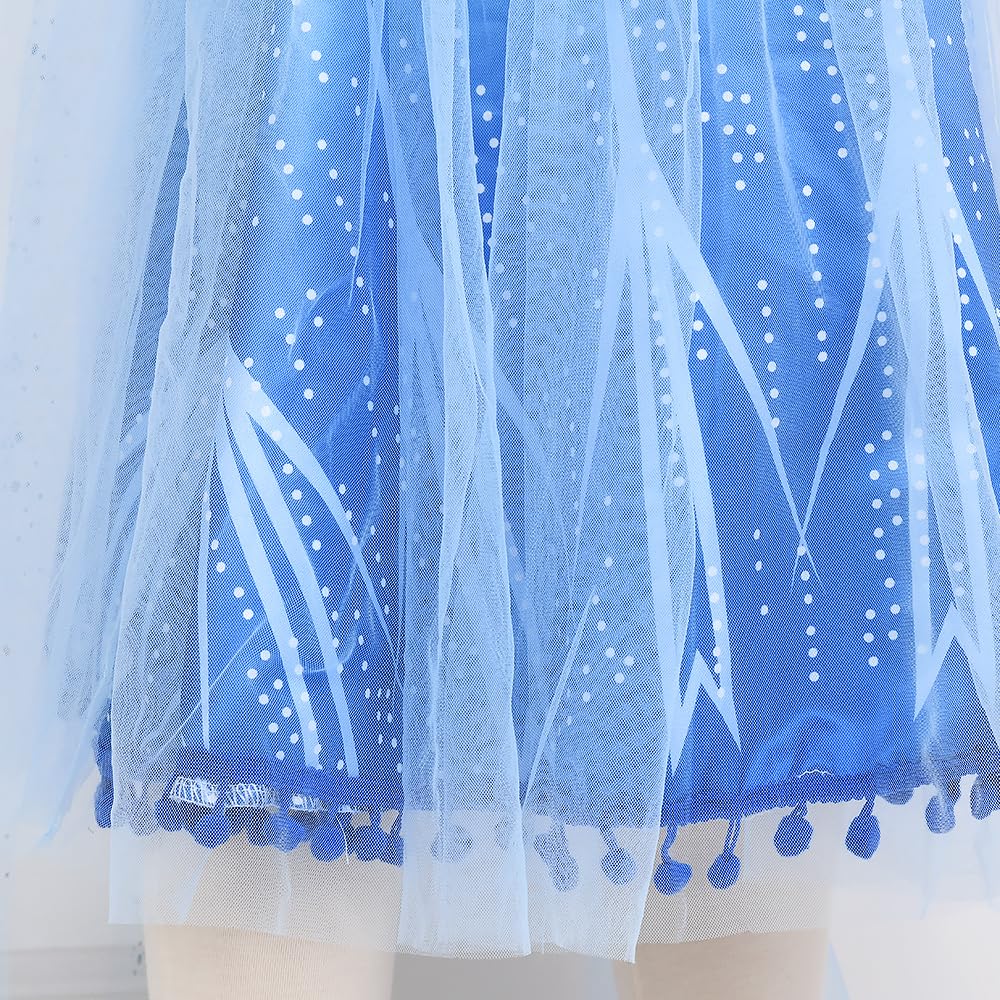 Tacobear pom-pom hem blue dress detail adds playful charm.