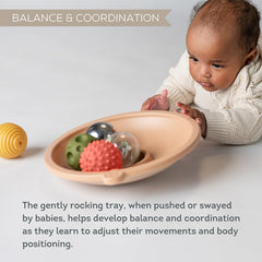 Taf Toys core muscle development during tummy time with a swaying play tray.