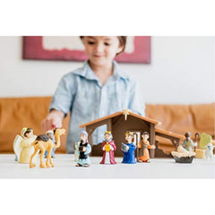 Tales of Glory birth baby Jesus storybook display supports learning through interactive reading.