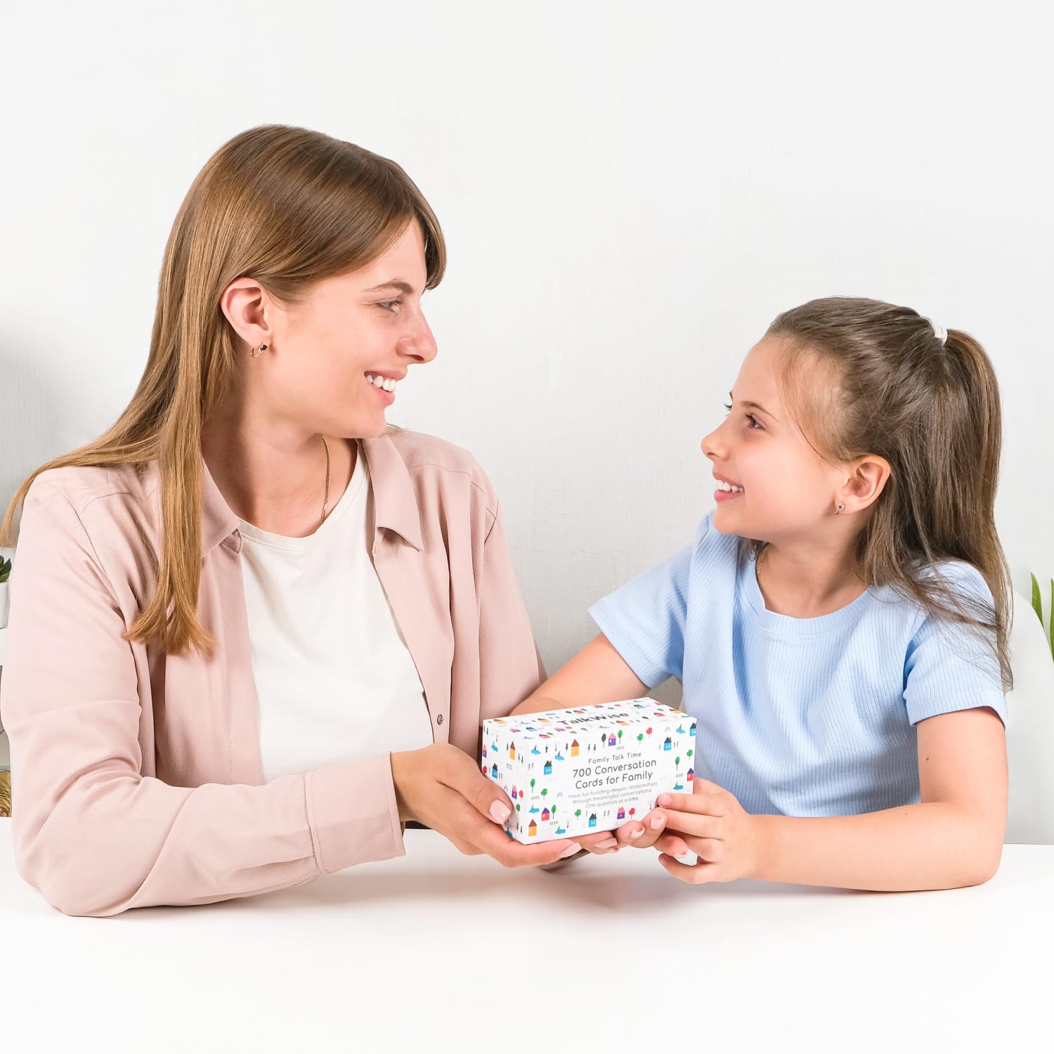 TalkWise educators using conversation starters in classroom or therapy settings.