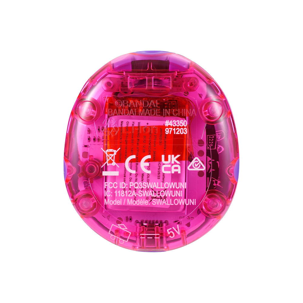 Tamagotchi Uni charging setup with USB-C cable.