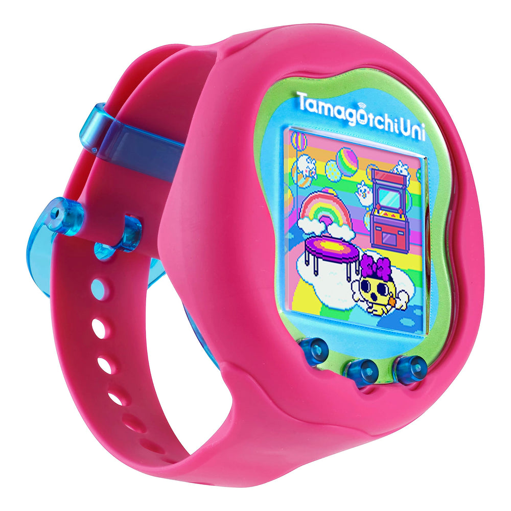 Tamagotchi Uni pink band worn on wrist for on-the-go Tamaverse access.