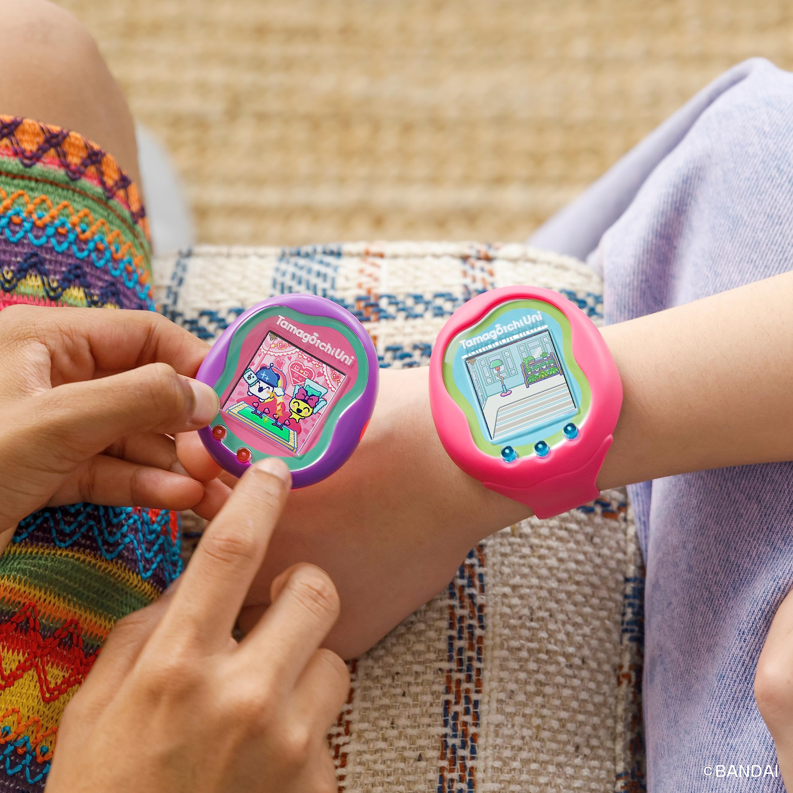 Tamagotchi Uni tamaverse worlds illustrating global social play and exploration.