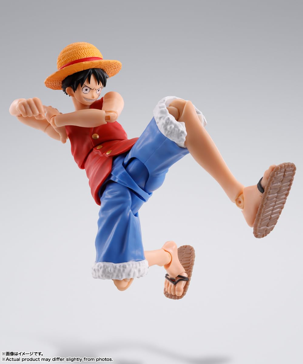 TAMASHII NATIONS Luffy Romance Dawn S.H.Figuarts close-up face shows expressive detail.