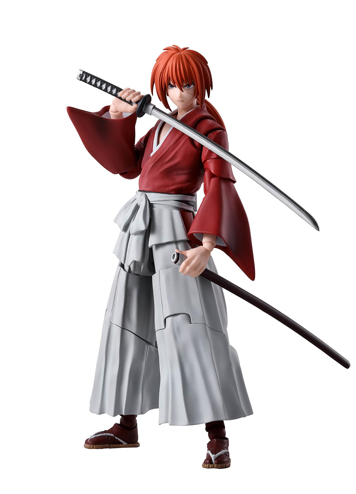 Tamashii Nations Kenshin figure with drawn reverse-blade sword for dynamic display
