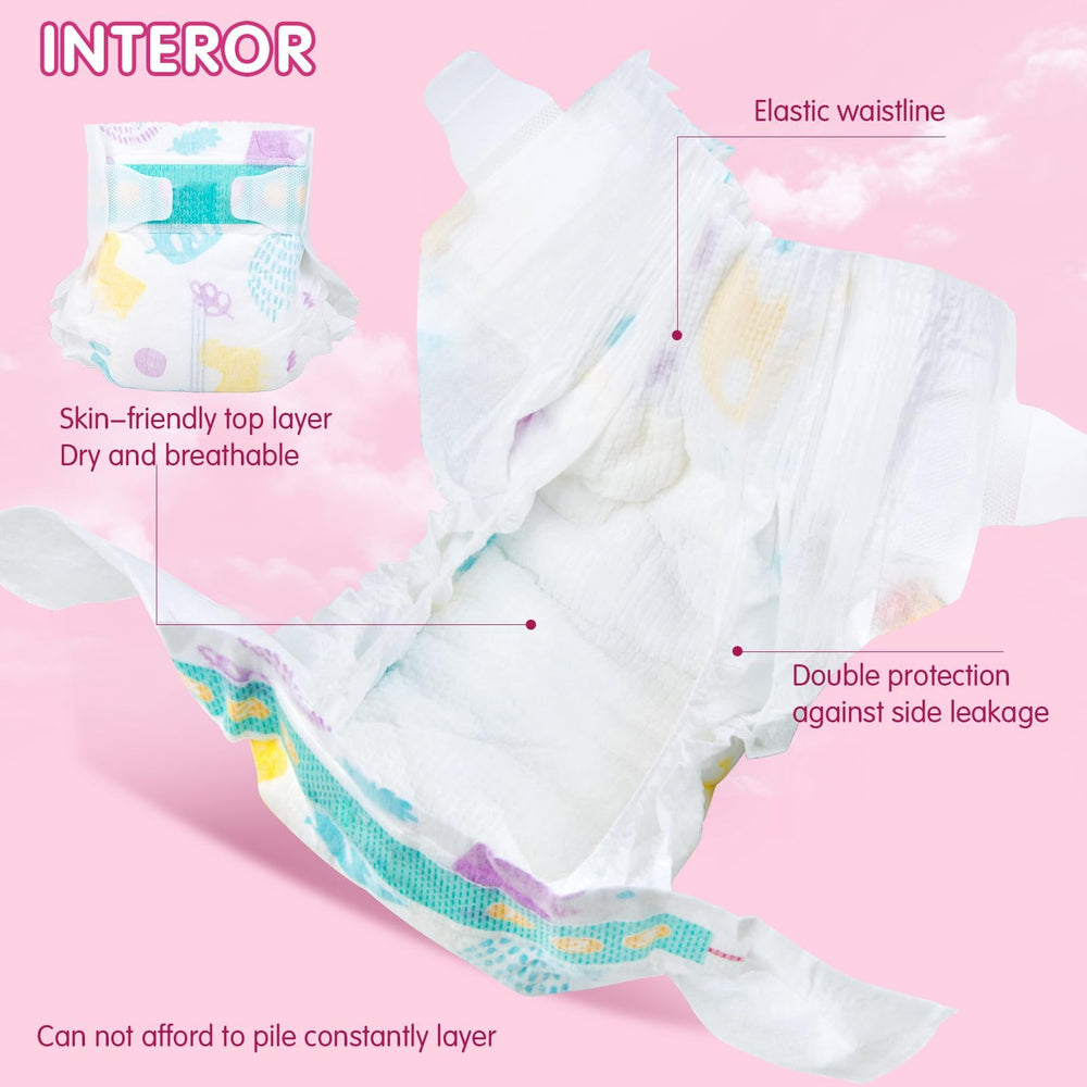 TatuDoll feeding set closeup with diapers for realism