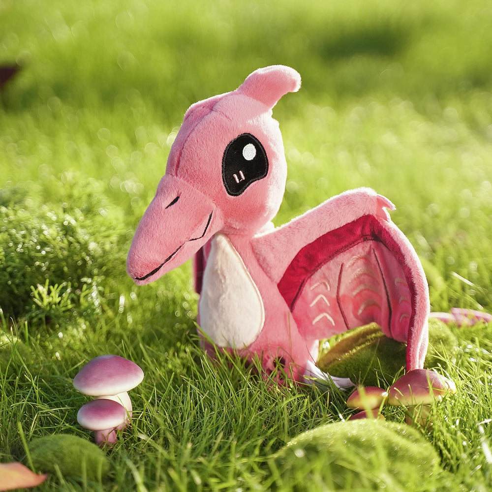 TCBunny pink dinosaur plush shown for hug friendly playtime