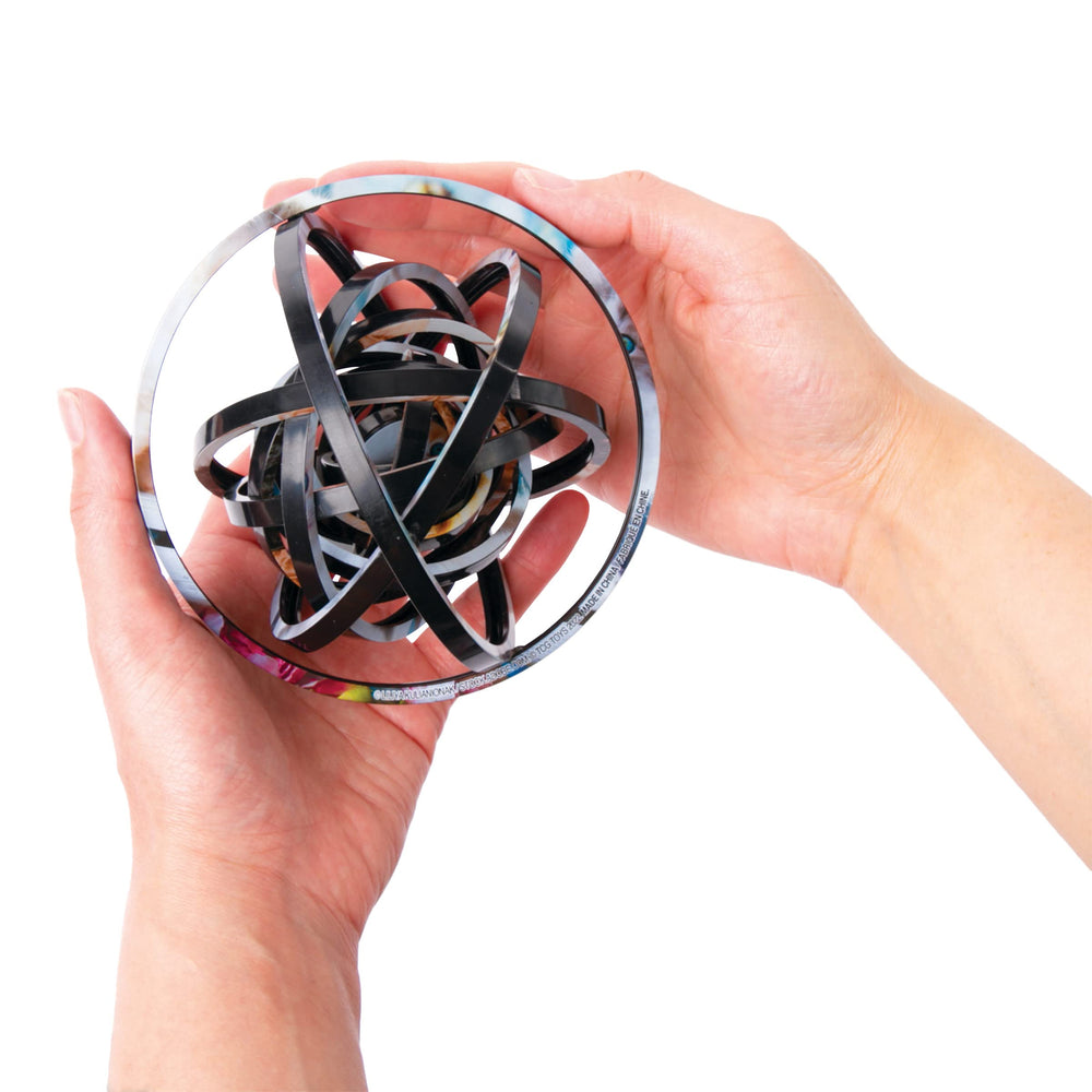 TCG Toys Spin Flip Puzzle concentric rings detail for tactile interaction