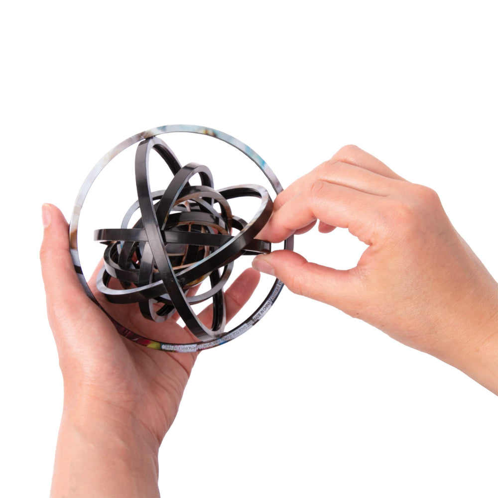 TCG Toys Spin Flip Puzzle palm-sized companion for travel and focus