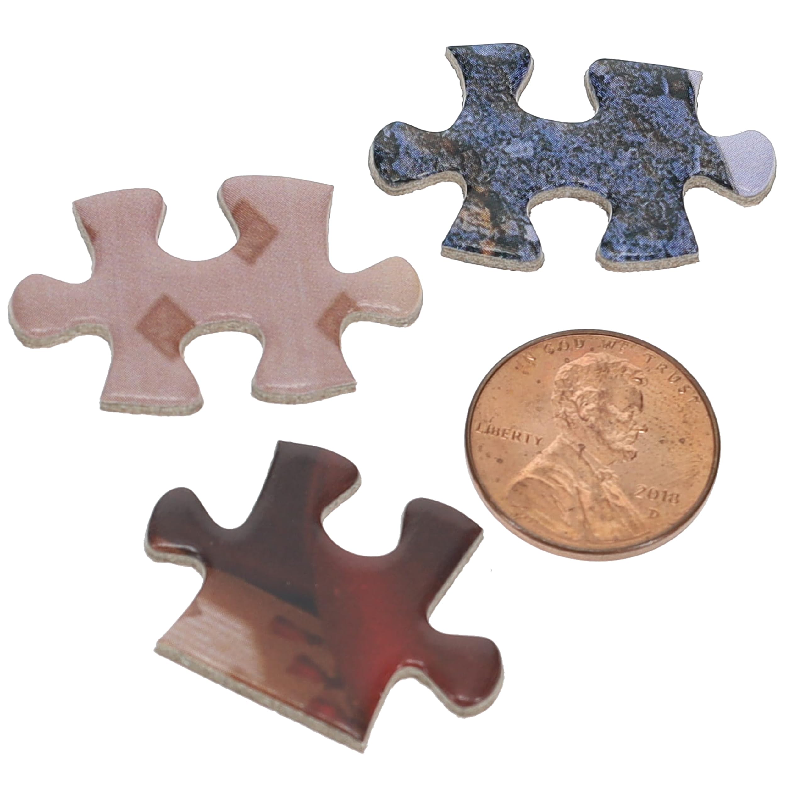 TDC Games Alphabet Mystery Puzzle no art on pack heightens the guessing atmosphere.