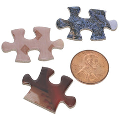 TDC Games Alphabet Mystery Puzzle no art on pack heightens the guessing atmosphere.